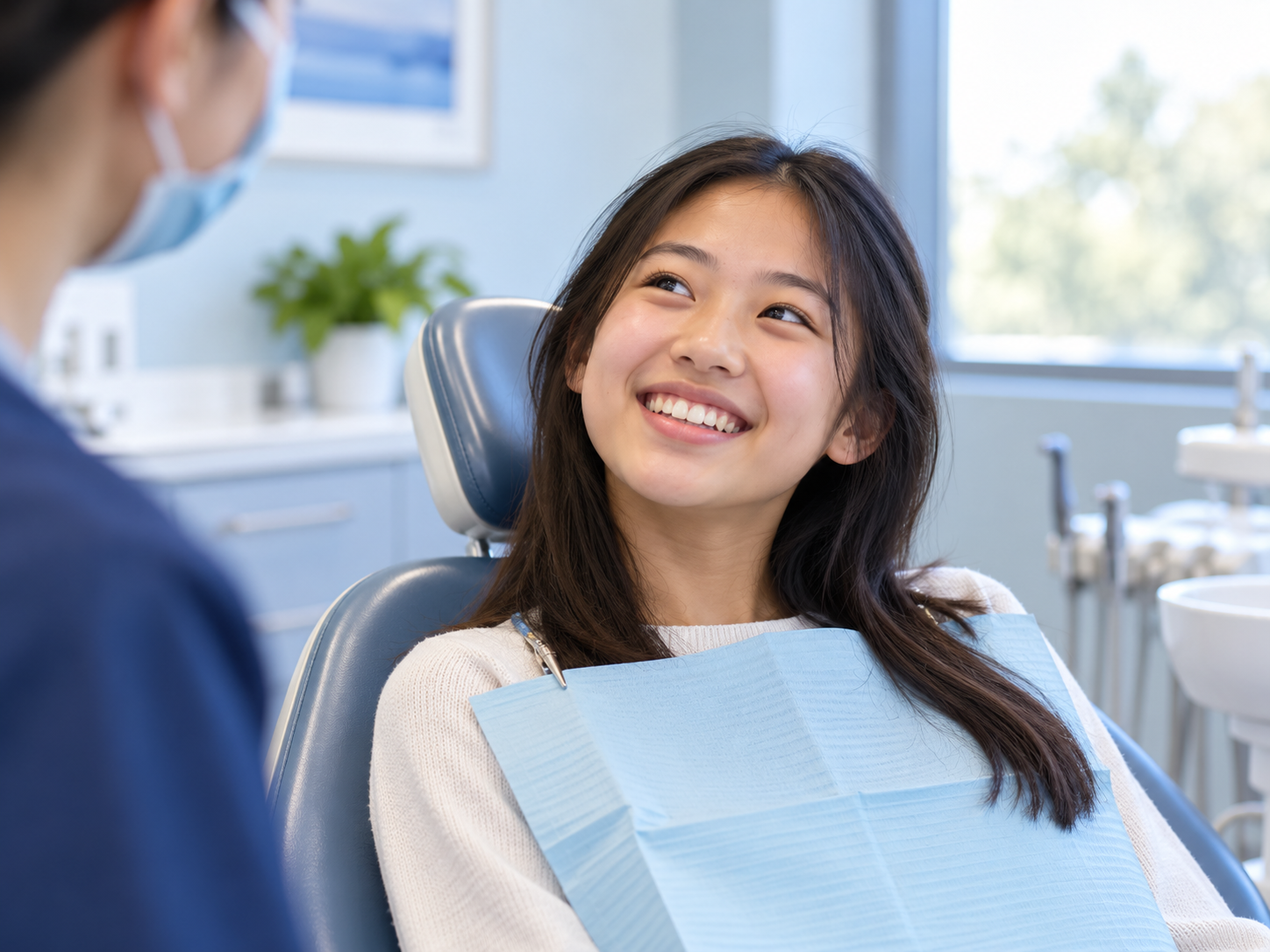 Illustrative image of a smiling teen in a dental chair
